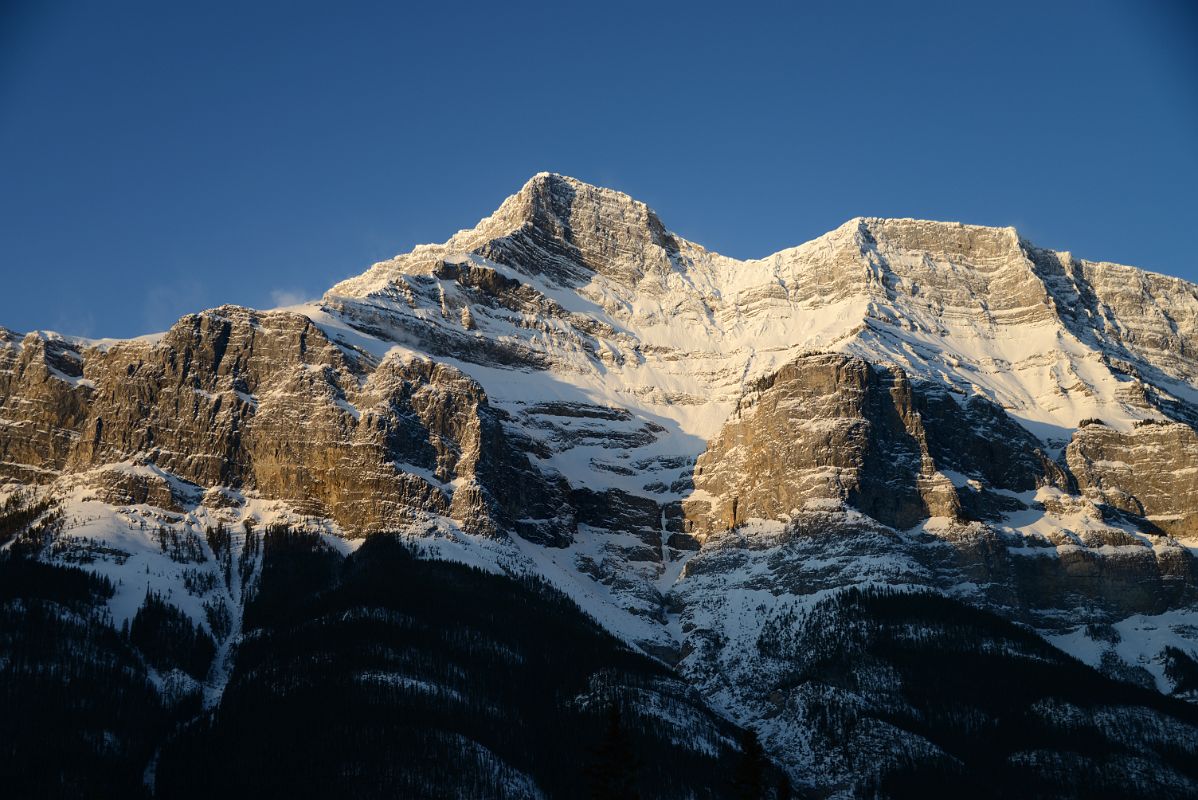 23B The Ridge From Mount Rundle 1 Descends To Banff From Trans Canada Highway Between Canmore and Banff In Winter At Sunrise